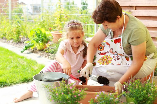 Gardener preparing a residential garden service agreement